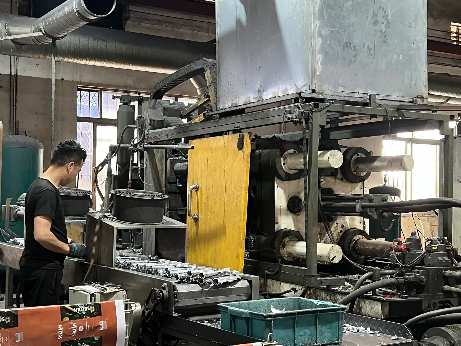 Die-casting machine on the LeeYuen factory floor in Jiangmen, Guangdong